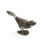 A metalware novelty bird pepper pot, possibly Spanish, modelled in a standing position, textured