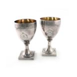 A pair of George III silver goblets, by Solomon Hougham, London 1802, vase form, engraved foliate