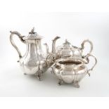 λA Victorian silver coffee pot, teapot and sugar bowl, the coffee pot by Robert Hennell, London