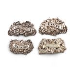 A collection of four antique silver wine labels, comprising: one by Robert Gainsford, shaped form,