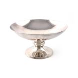 By Cartier, a sterling silver tazza, circular bowl, on a fluted knopped stem on a raised circular