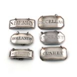 A collection of six antique silver wine labels, plain rectangular form, reeded borders,