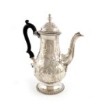 A George IV silver coffee pot, by Thomas Ballam, London 1824, in the 18th century manner, baluster