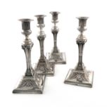 A set of George III silver candlesticks, by John Carter II, London 1774, tapering square baluster