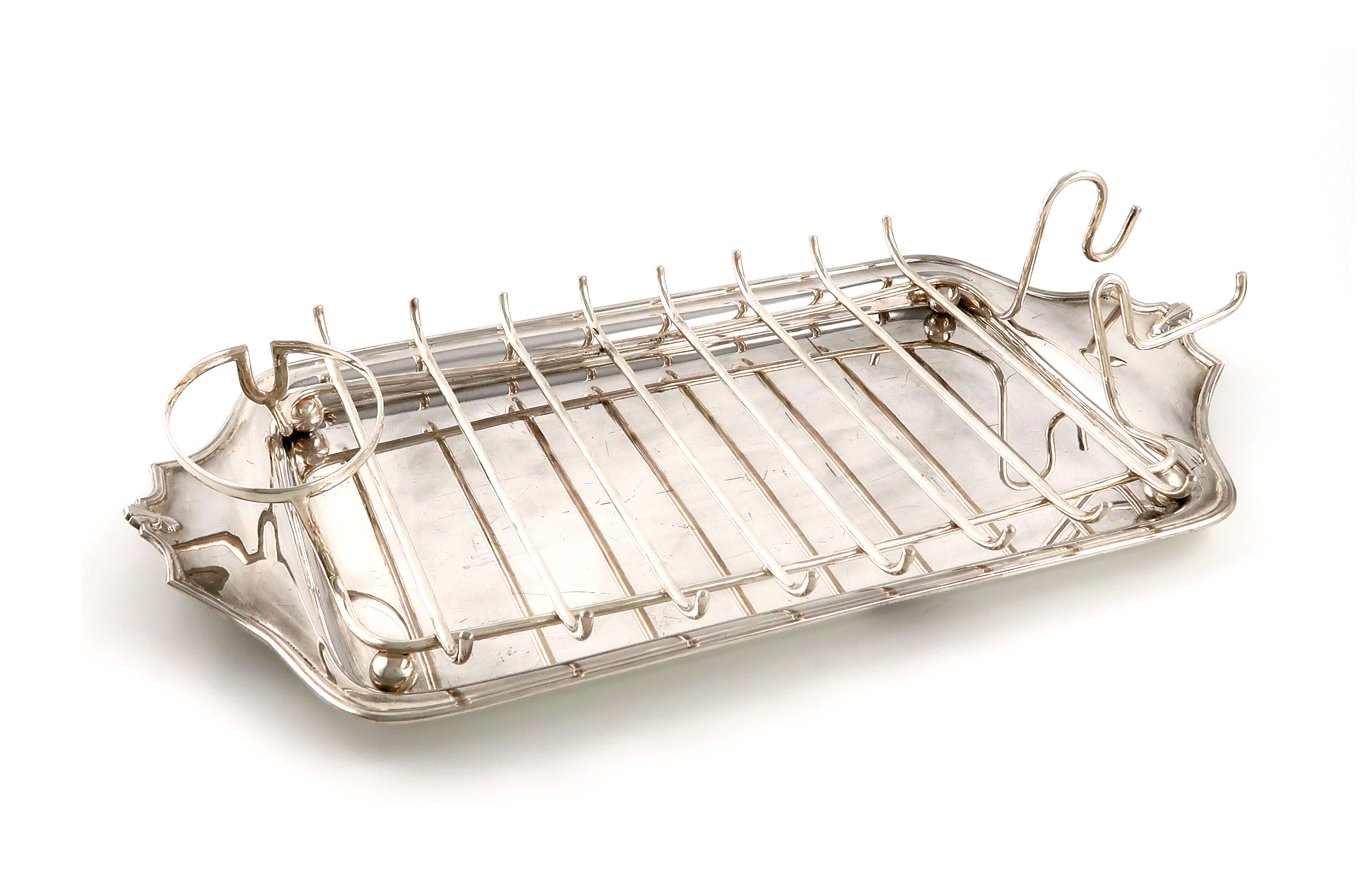 By Asprey London, an electroplated asparagus serving dish, of shaped rectangular form, moulded