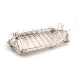 By Asprey London, an electroplated asparagus serving dish, of shaped rectangular form, moulded