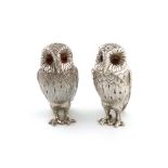 A matched pair of modern novelty silver owl salt and pepper pots, one by R. Comyns, London 1978, the