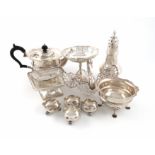 A mixed lot of silver items, various dates and makers, comprising: a teapot and sugar bowl,