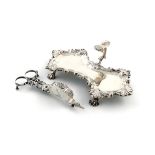 A George II silver snuffer tray, by William Cafe, London 1757, of shaped rectangular form, shell and