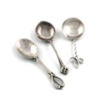 A collection of three silver spoons, comprising: two teaspoons by Winifred King & Co, Birmingham