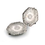 A pair of George II silver waiters, by Lewis Pantin, London 1733, circular form, shaped border,