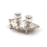 A small Victorian silver inkstand, by The Barnards, London 1845, shaped oval form, foliate