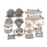 A mixed lot of wine labels, comprising silver ones: a modern armorial pair, incised 'CLARET' and '