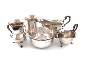 A mixed lot of silver items, comprising: a pair of mugs, by Charles Green and Co., Birmingham