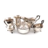 A mixed lot of silver items, comprising: a pair of mugs, by Charles Green and Co., Birmingham