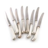 A set of eight Victorian silver Pistol-grip handled table knives, by Francis Higgins, London 1894,