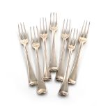 A collection of seven George I/II silver Hanoverian pattern table forks, various London dates and