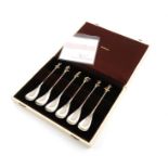By Aurum Ltd, a cased set of six modern commemorative parcel-gilt silver spoons, London 1976,