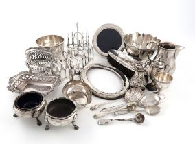 A mixed lot of silver items, various dates and makers, comprising: a pair of George III salt cellars