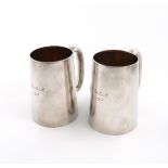 A pair of silver mugs, by William Hutton & Sons, Sheffield 1913, tapering circular form, scroll