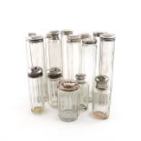 A collection of fifteen silver and electroplated mounted toilet jars and bottles, clear glass