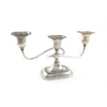 A presentation silver dwarf candelabrum, by James Dixon and Sons, Sheffield 1955, rounded