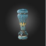 A turquoise and amethyst desk seal, late 19th century, of baluster form, pavé-set with graduated