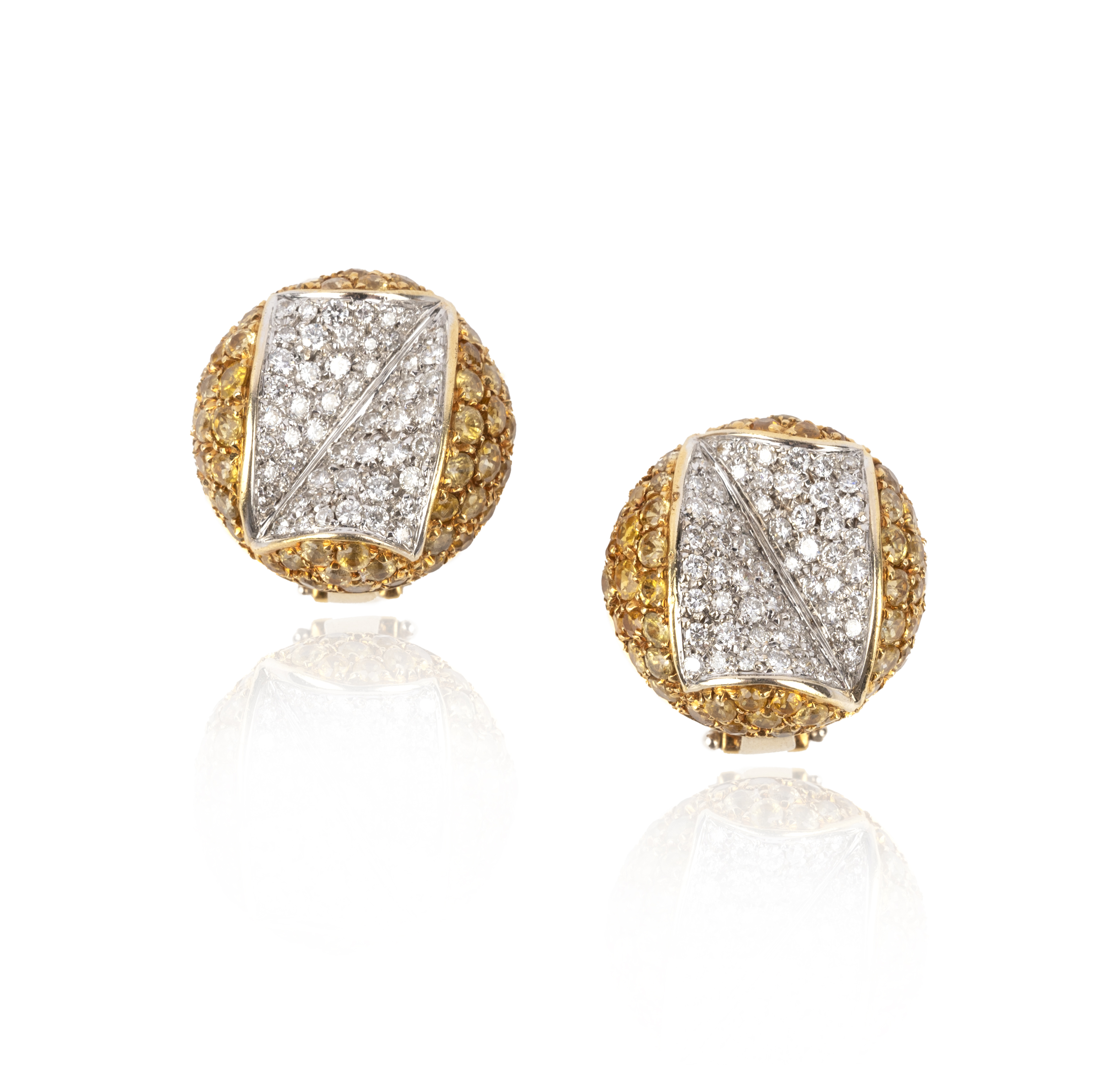 A pair of yellow sapphire and diamond bombe earrings, set with a central panel of circular-cut