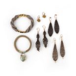 A group of hair work jewellery, comprising: a mourning bracelet composed of woven hair, to gold