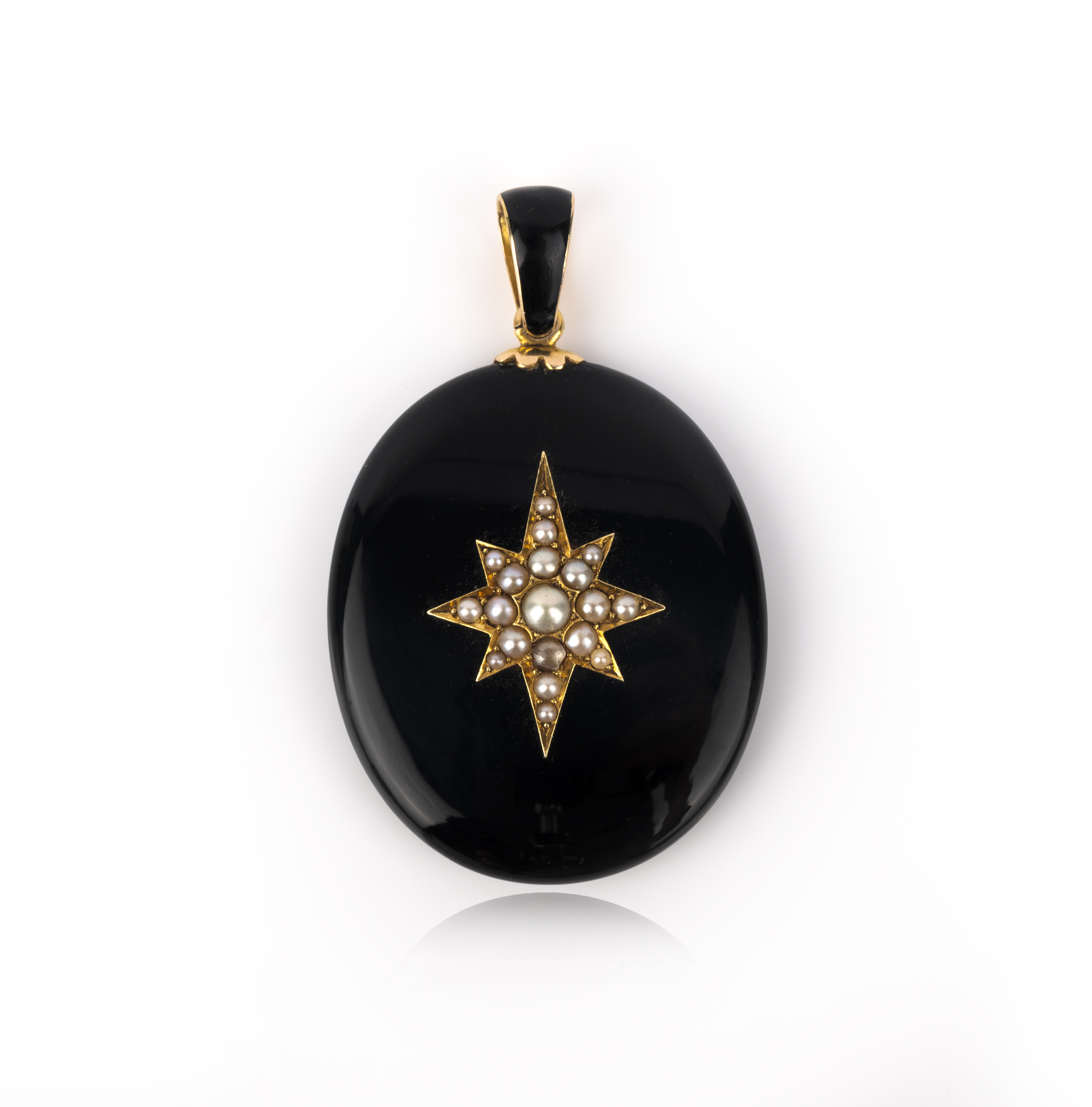 An enamel and pearl locket, late 19th century, of oval outline, the front and bail applied with