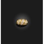 A diamond ring, of bombé form, the front of twist design, pavé-set with stripes of circular-cut