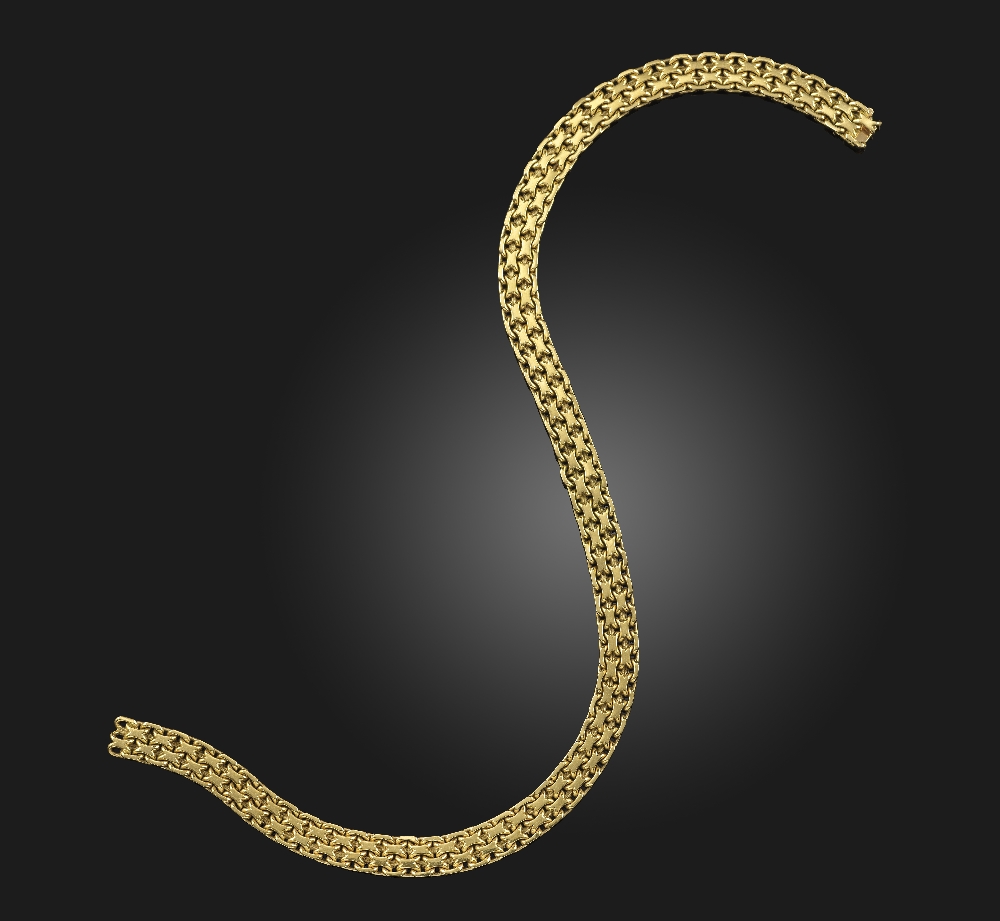 Boucheron, a gold necklace, 1976, the articulated collar composed of conjoined cable linking, to a