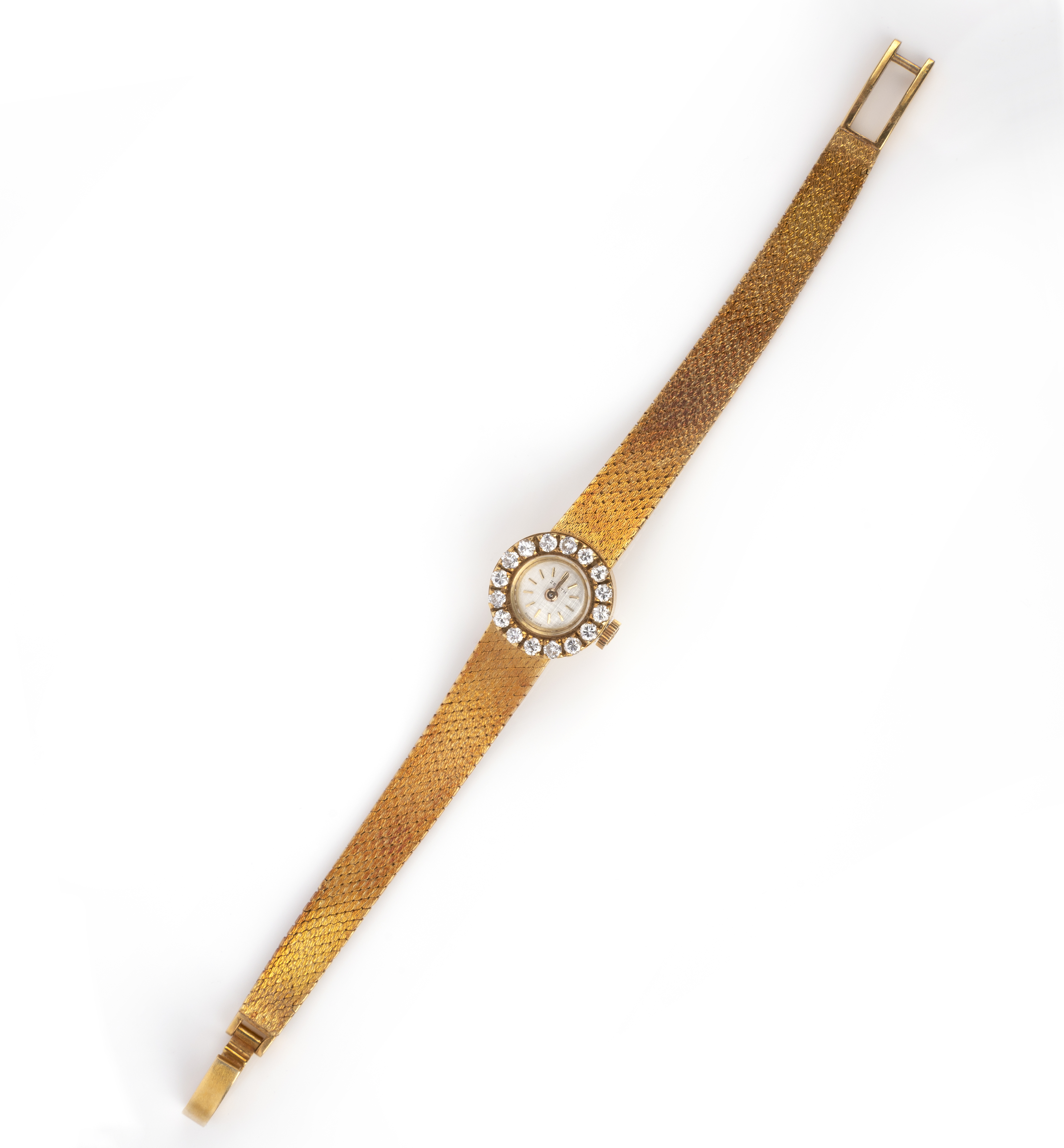 Zenith, a ladies gold and diamond wristwatch, signed dial with baton numerals, manual winding,