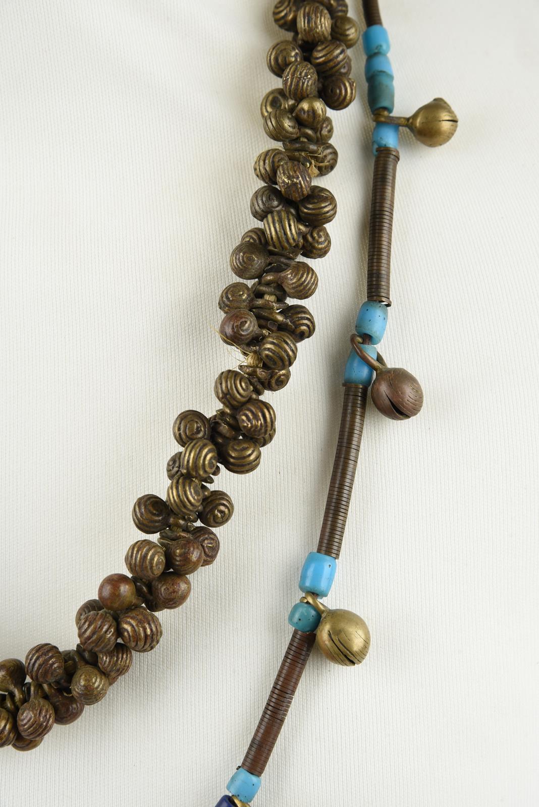 Five Nepal metal mounted necklaces including one with an amulet box and a double strand with cog - Image 14 of 17