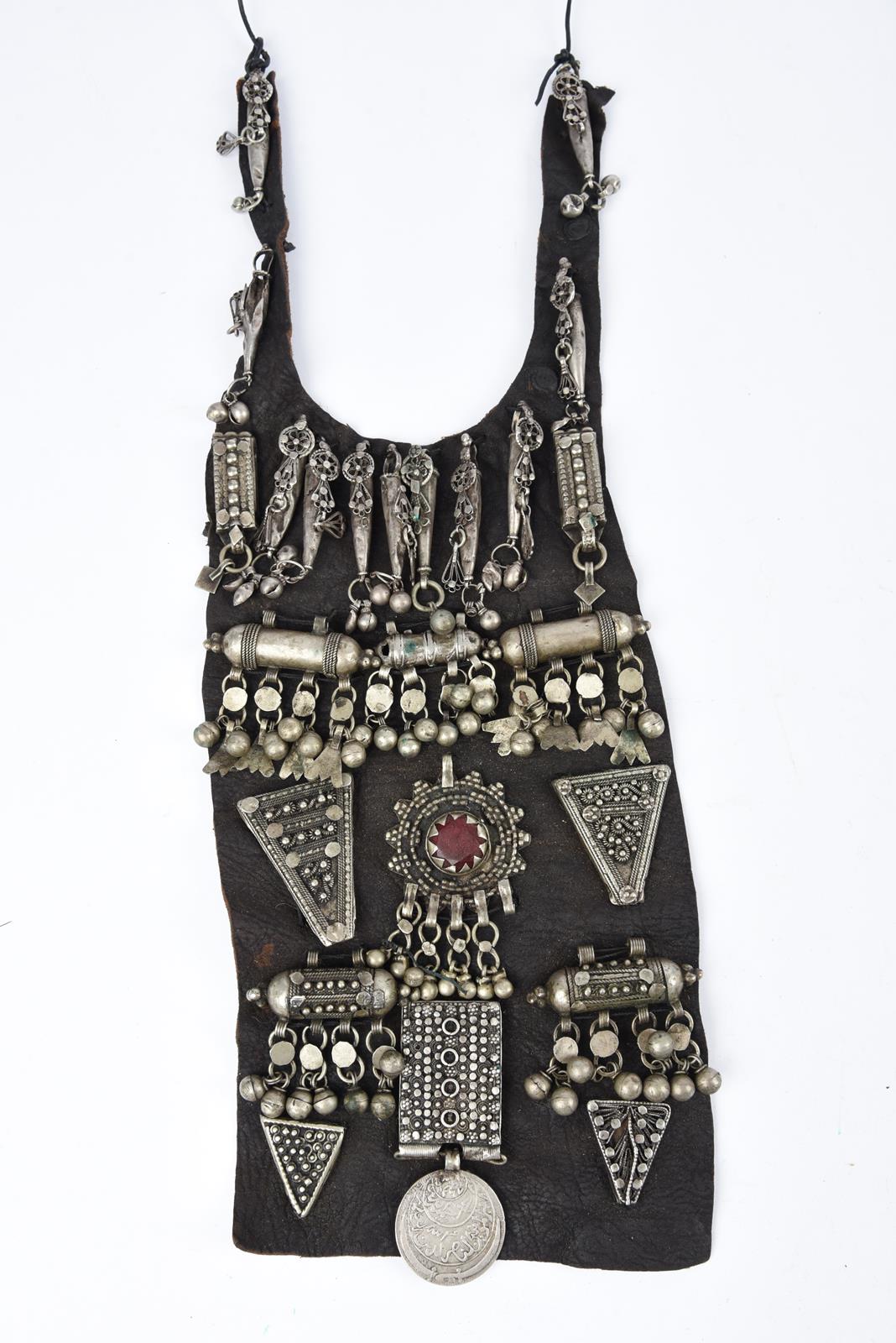 λA Bedouin amulet chest ornament cloth with numerous sewn on amulets and beads, 62cm long, and three - Bild 6 aus 27
