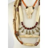 Three Naga necklaces Nagaland shell, brass, bone, agate and glass beads, including a chank pendant