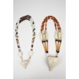 A Naga shell and bead necklace Nagaland with a large chank shell, bone spacers and glass and