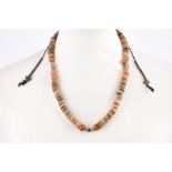 λFive Himalayan mala, prayer beads yak bone, three with inset glass fragments and metal bands, two