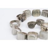 Ten Tuareg rings North Africa silver coloured metal with incised Islamic script or symbols and