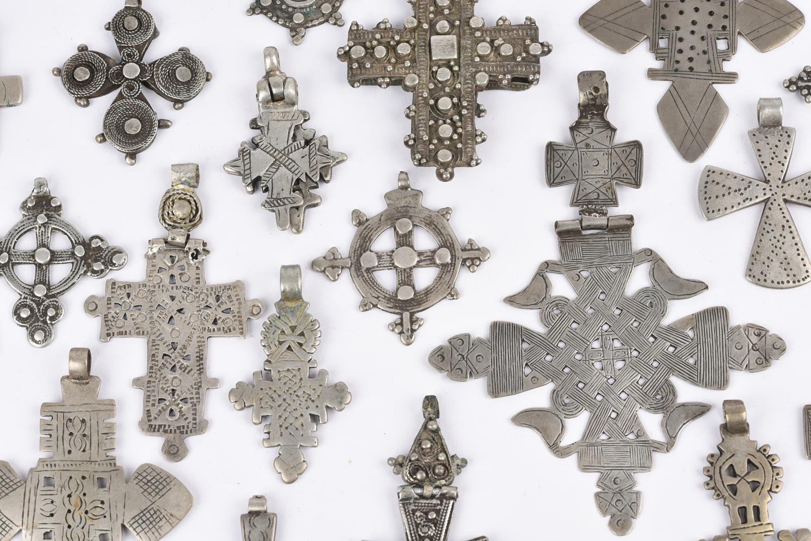 Twenty nine Ethiopian Coptic cross pendants silver coloured metal, one brass, twelve hinged with one - Image 10 of 28
