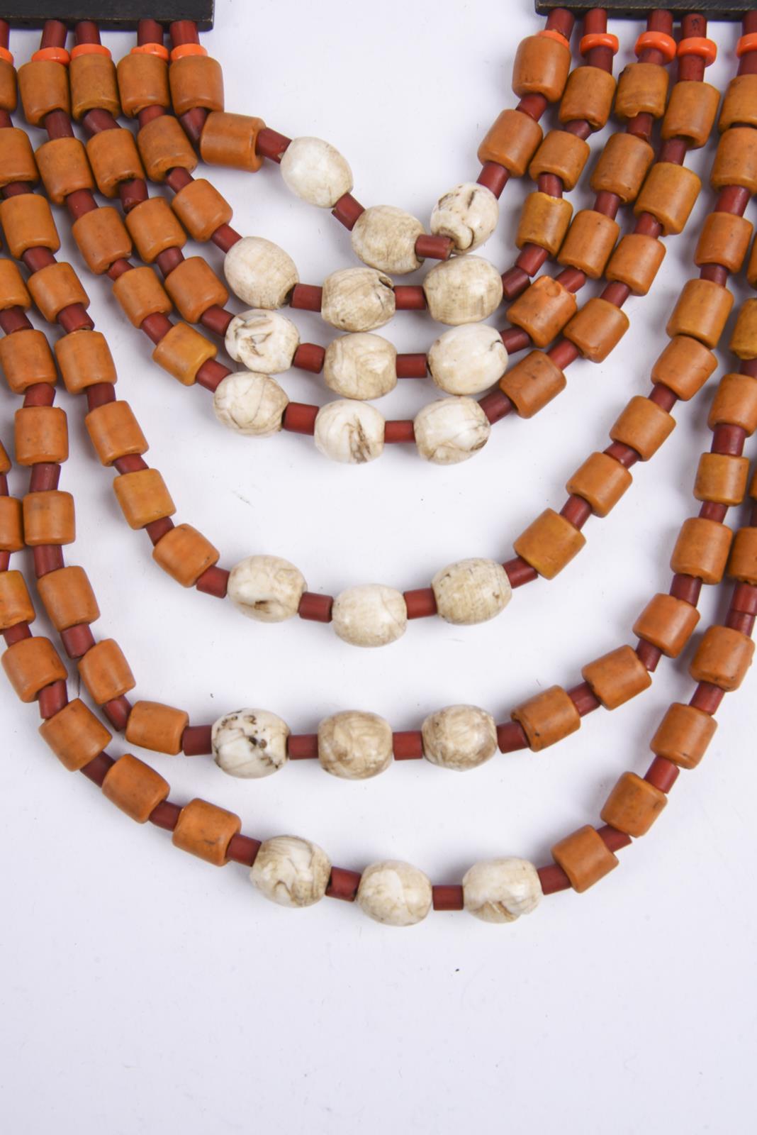 Three Naga necklaces Nagaland coloured glass beads, brass, shell and fibre, one hung with brass - Image 4 of 5