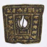 A Tibet fibula cast brass with twelve zodiac animals and auspicious emblems along the top, the