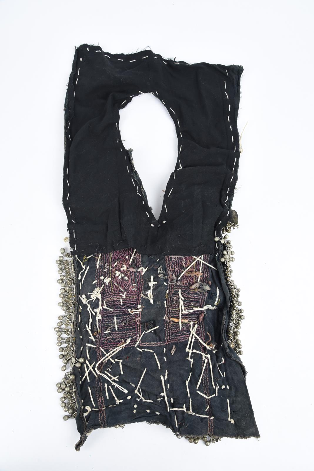 λA Bedouin amulet chest ornament cloth with numerous sewn on amulets and beads, 62cm long, and three - Image 26 of 27