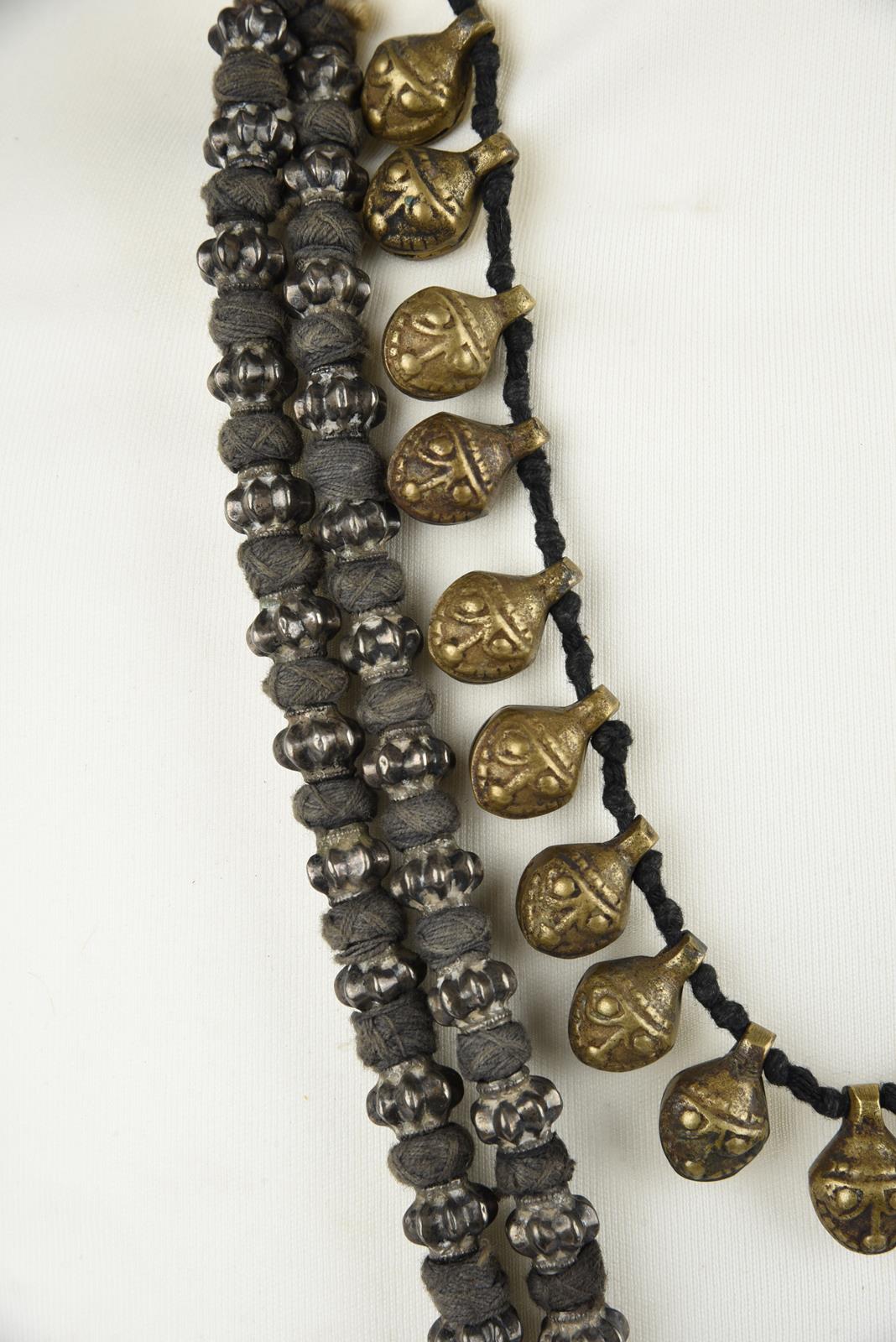 Five Nepal metal mounted necklaces including one with an amulet box and a double strand with cog - Image 6 of 17