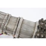 Three Indian flexible armbands bazuband Rajasthan silver coloured metal, with cotton links, the