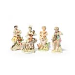 A matched pair of Derby figures of musical shepherds, c.1760-80, she seated and playing the