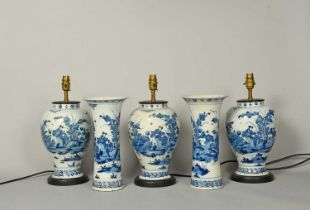 A garniture of five Delft vases, c.1760, comprising three baluster and two sleeve vases, each