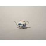 A Lowestoft blue and white miniature teapot, c.1761-62, the small globular body painted with small