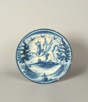 A large maiolica dish or charger, 18th century, possibly Savona, painted in blue with three birds in