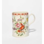 A large Bow mug, c.1765, of cylindrical form with a slightly flared foot, brightly decorated in